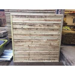 Waney lap fence panels