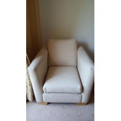 Large beige sofa with matching chair