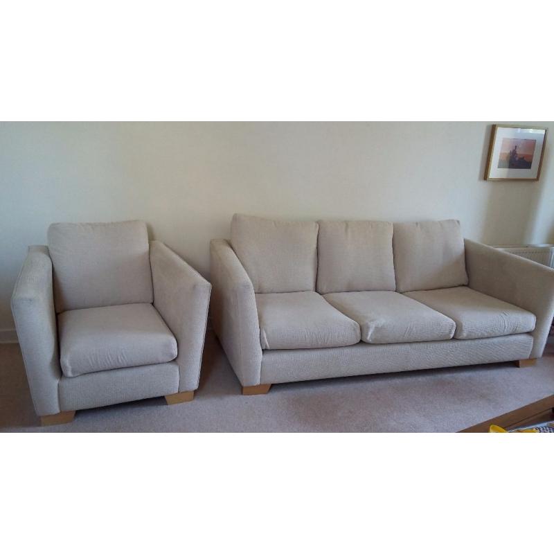 Large beige sofa with matching chair