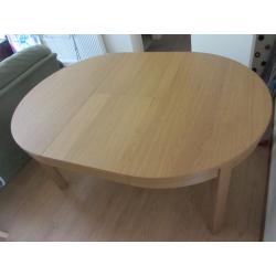 Extendable round wooden table with 4 chairs