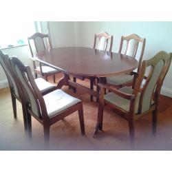 dining table extendable and 6 chairs selling because moving