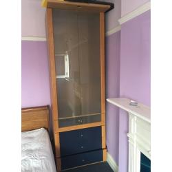 Tall wardrobe with draws