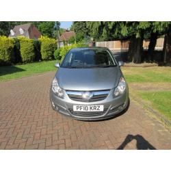 2010 VAUXHALL CORSA 1.4I 5DR PETROL HATCHBACK IN SILVER.