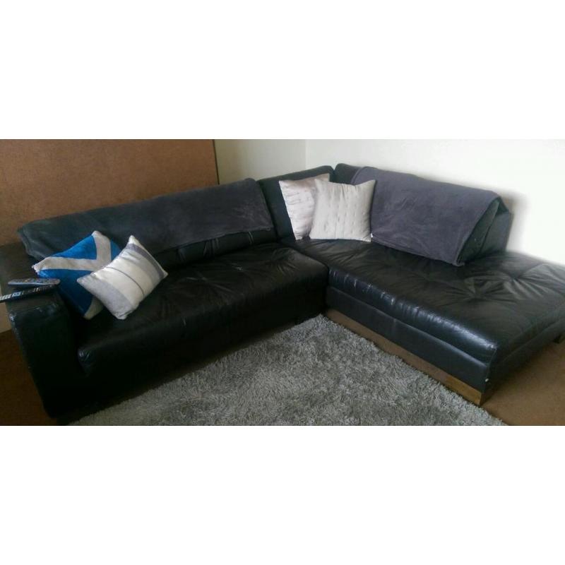 Corner settee and pouffe