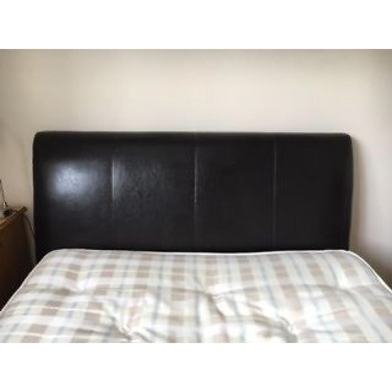 Small 4ft double bed. Excellent condition. Smart faux dark brown leather padded headboard.