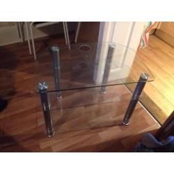 Glass coffee table, a/v unit and kitchen table in great condition