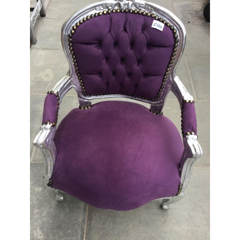 Child's armchair , good condition , covered in purple material and silver frame.