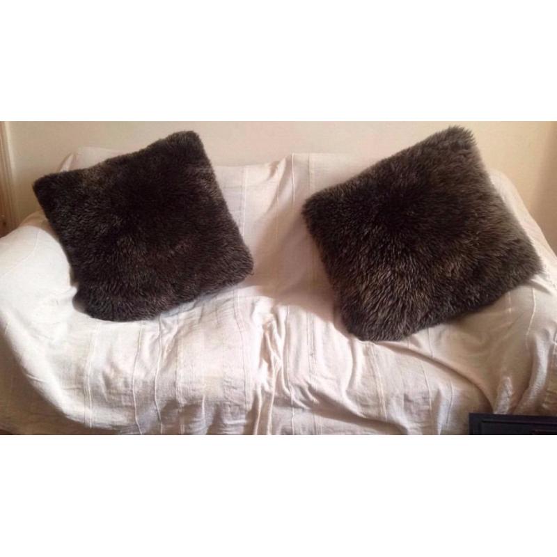 Two lovely big fluffy brown pillows