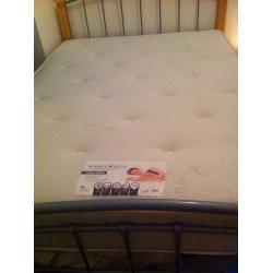 Nearly new double bed with orthopedic mattress