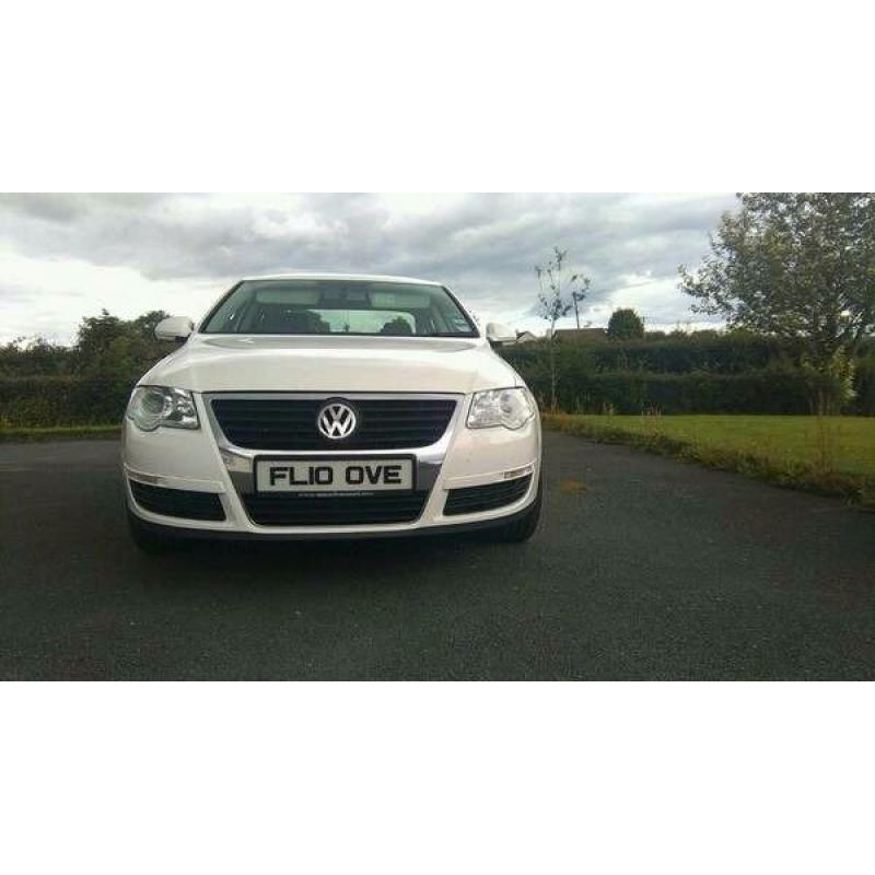 2010 White VW Passat