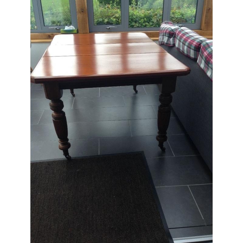 Victorian extending wind out dining table.