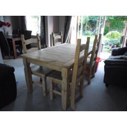 SOLID PINE TABLE AND FOUR CHAIRS