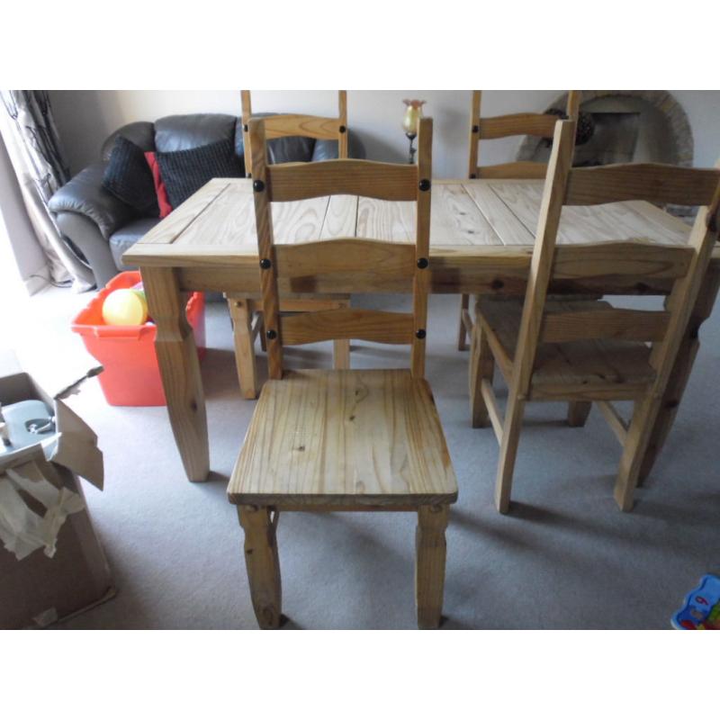 SOLID PINE TABLE AND FOUR CHAIRS