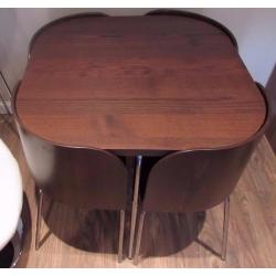 Space saving wooden dining table and chairs