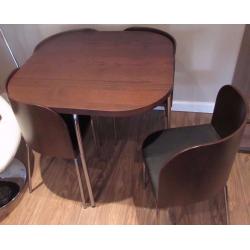 Space saving wooden dining table and chairs