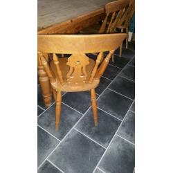 traditional pine farmhouse table and 6 chairs.