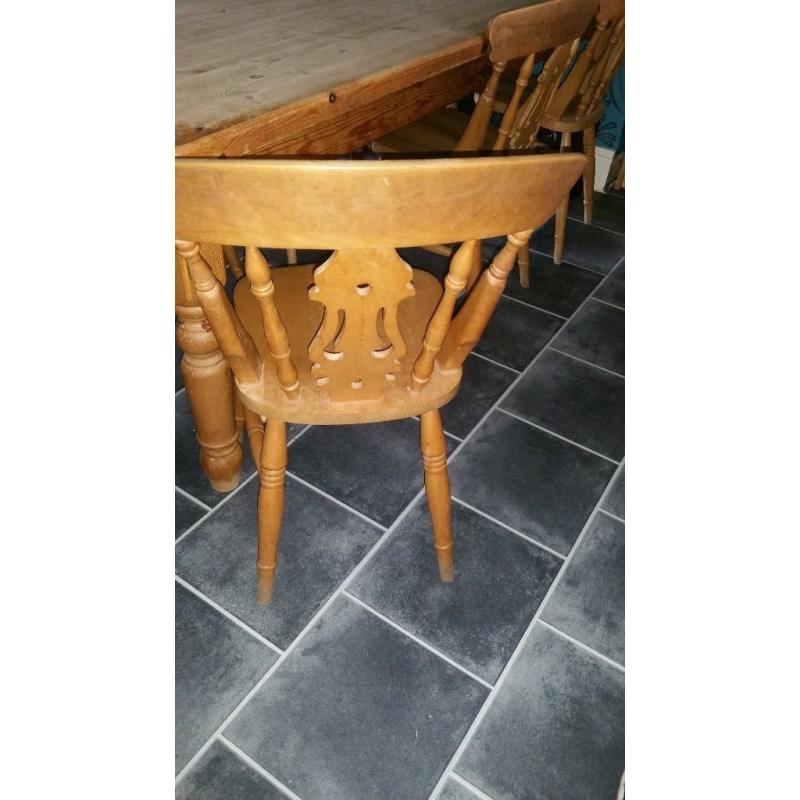 traditional pine farmhouse table and 6 chairs.