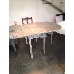 Attractive solid wood drop leaf table