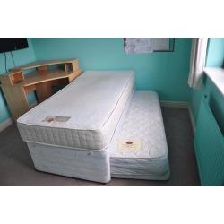 Single bed with pull out guest bed underneath