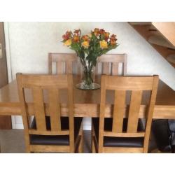 Extending dining table and chairs