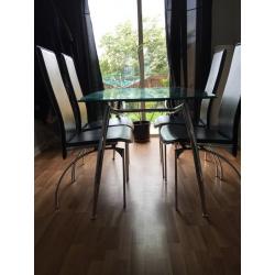 Dining table and 4 chairs