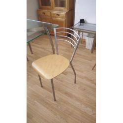 Glass top dining table with chrome/beech base and 4 matching chairs