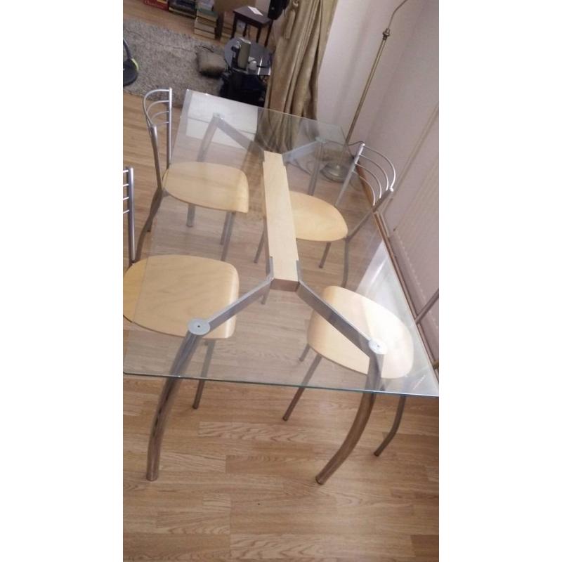 Glass top dining table with chrome/beech base and 4 matching chairs