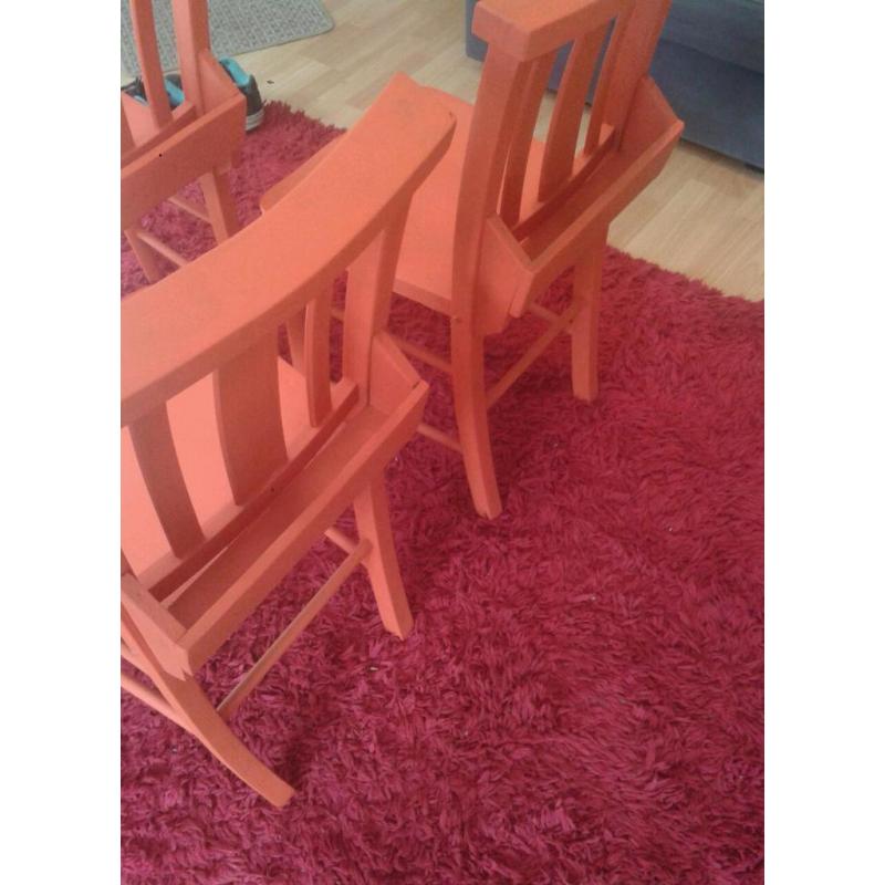 Wooden chairs orange