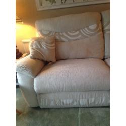 Cream sofa with pop up foot rests!