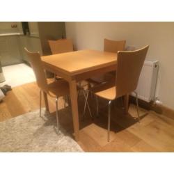 Extendable dining table and 4 chairs