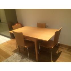 Extendable dining table and 4 chairs