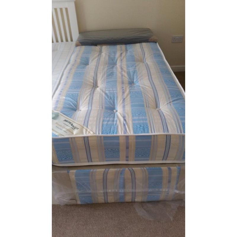 brand new single divan bed with storage space and orthopedic mattress and leather headboard