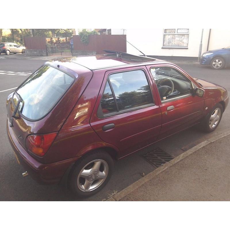 Ford Feista Ghia 1.25 Zetec brand new MOT and Toad Alarm System Mint condition 73k metalic burgundy