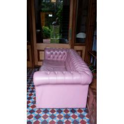 Pink chesterfield sofa