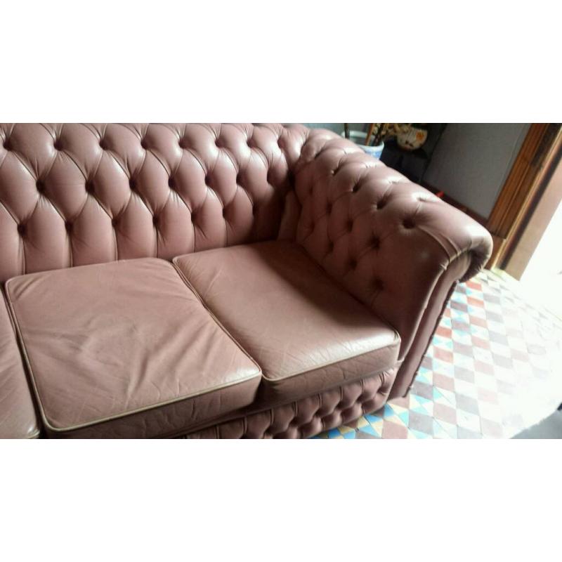 Pink chesterfield sofa