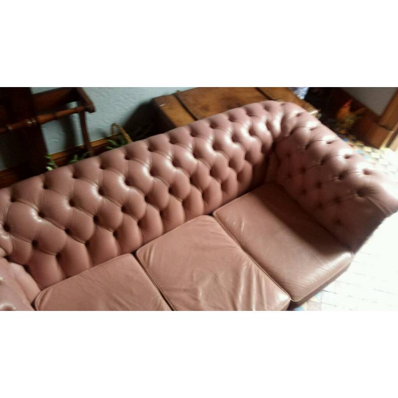 Pink chesterfield sofa